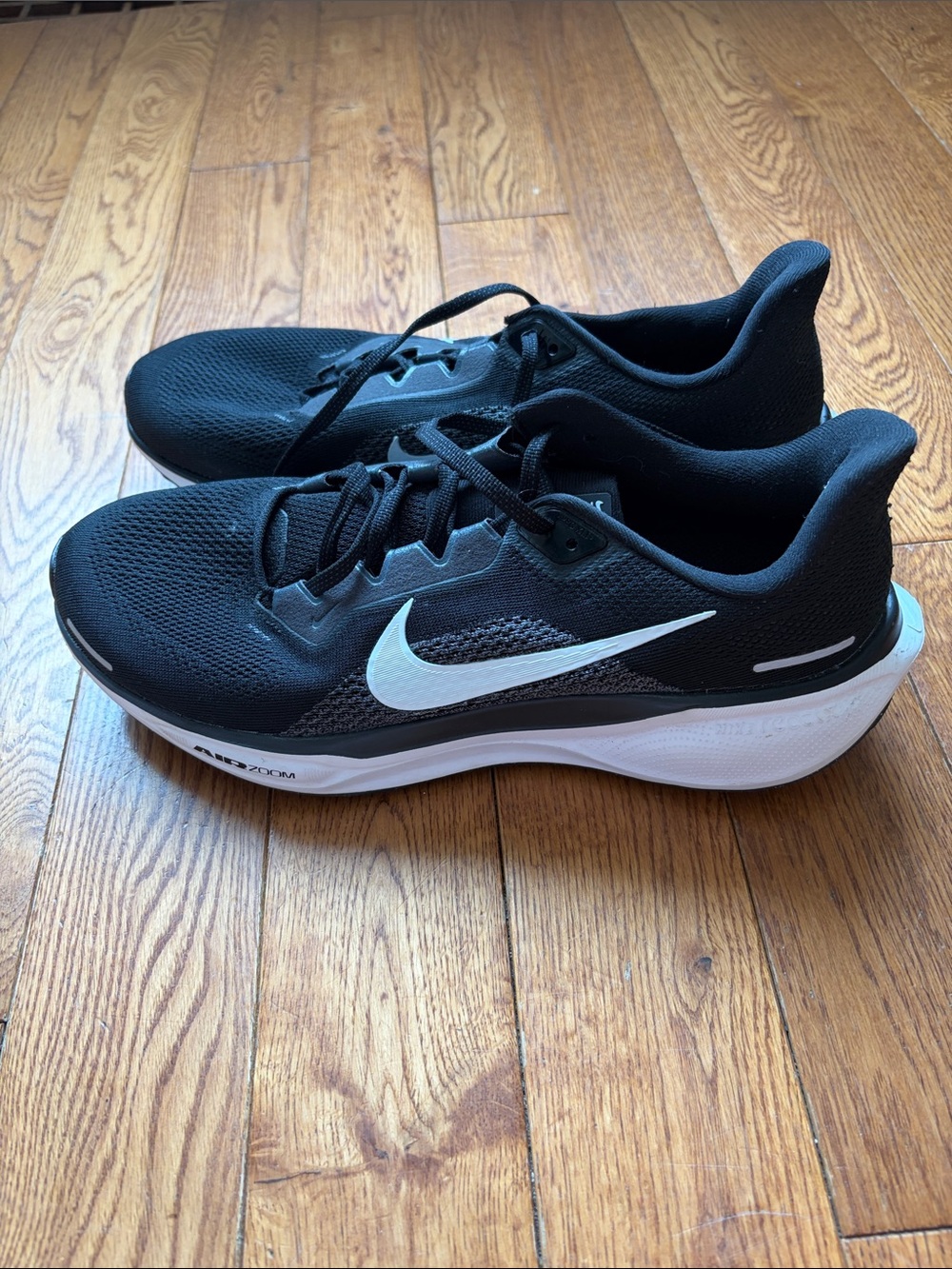 Nike Black Air Zoom Athletic Running Shoes with White Swoosh